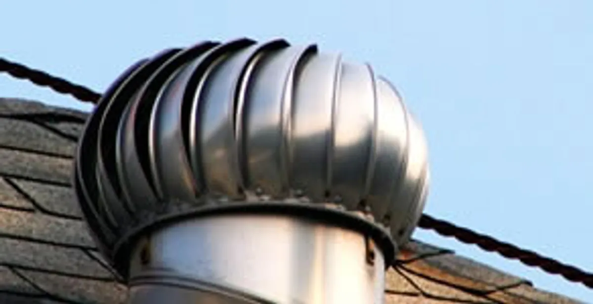 attic fan installation services with professionally installed roof ventilation unit in Overland Park, KS