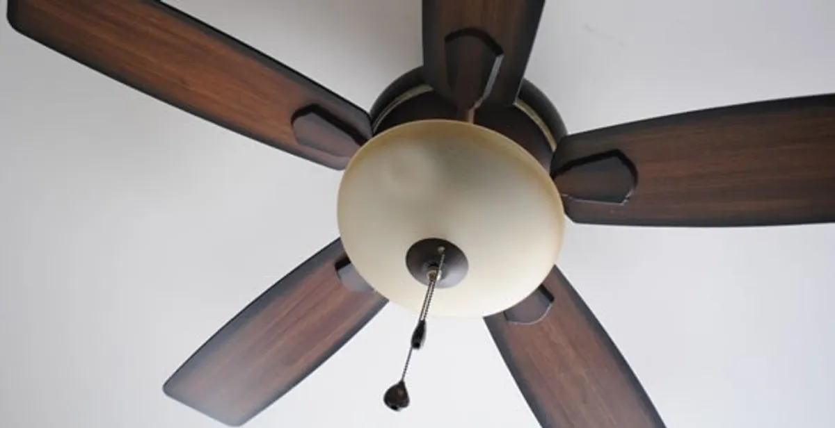 Fully installed ceiling fan with balanced blades and light fixture in Overland Park, KS