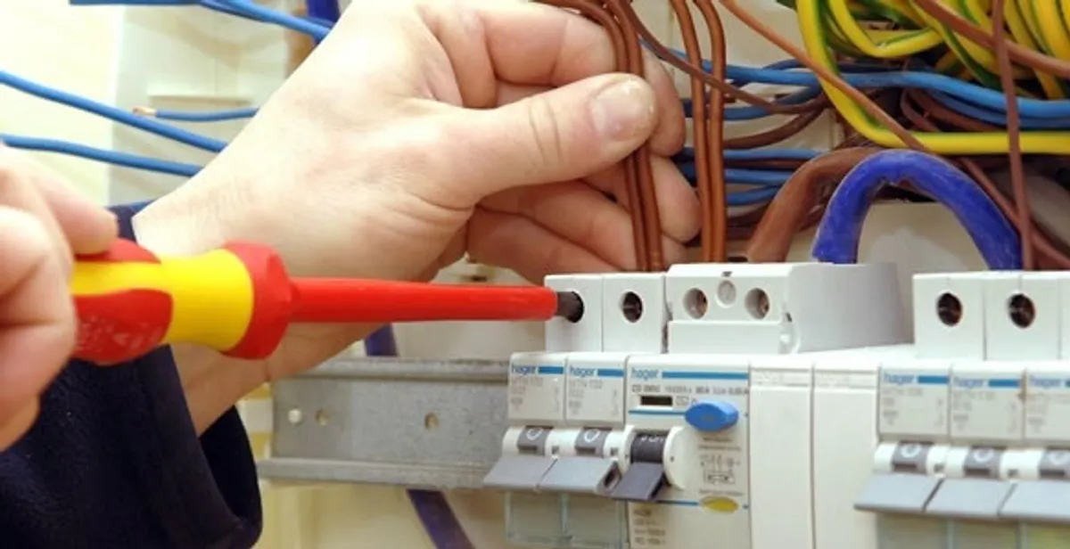 electrician services performing professional electrical panel wiring and connections in Overland Park, KS