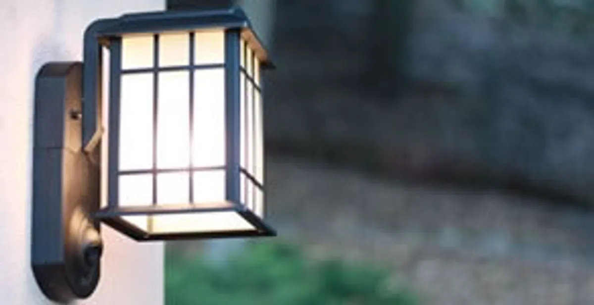 security light installation services with professionally mounted exterior wall light in Overland Park, KS